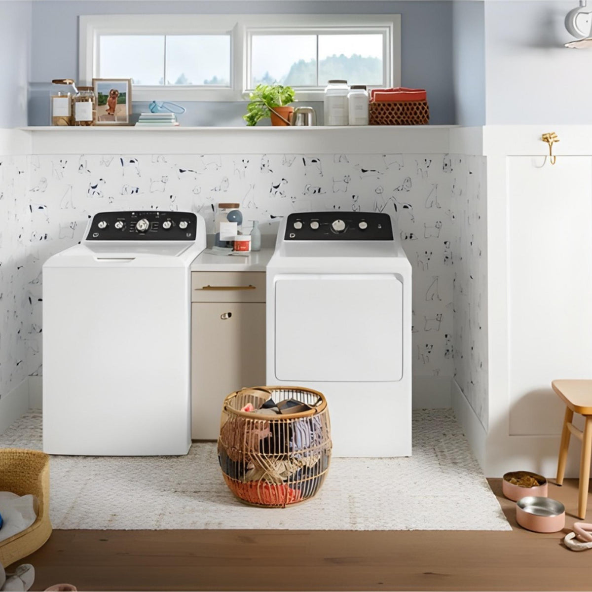White washer and dryer set against a light-colored wall with decorative elements.