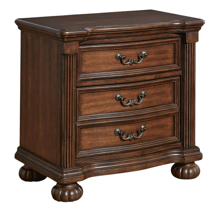 A three-drawer wooden nightstand with a warm brown finish, featuring decorative metal drawer pulls and turned feet, shown on a plain white background.