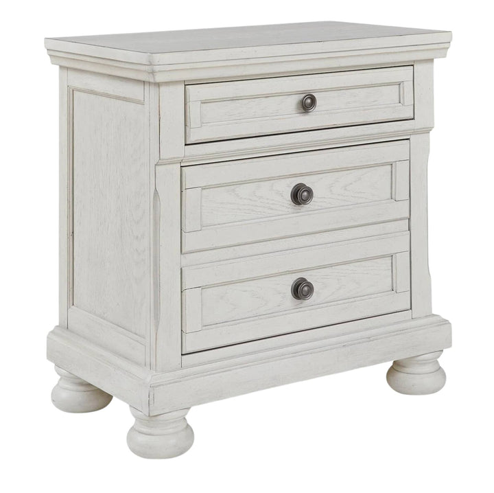 A white distressed wood nightstand with three drawers, round dark metal knobs, and turned feet, shown on a plain white background.
