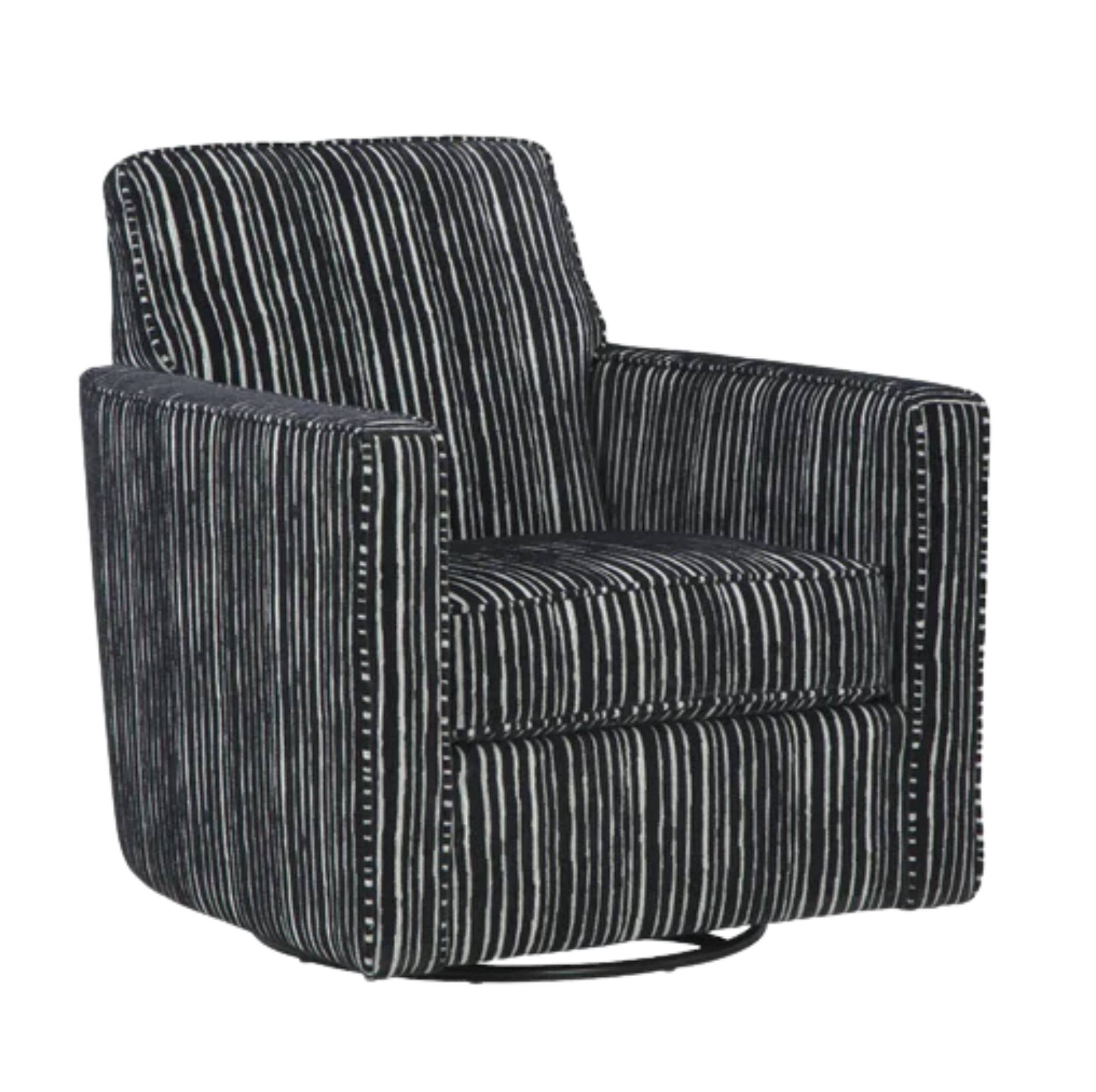 A modern swivel armchair upholstered in a black and white vertically striped fabric, featuring nailhead trim along the edges and a black circular swivel base, shown against a plain white background.