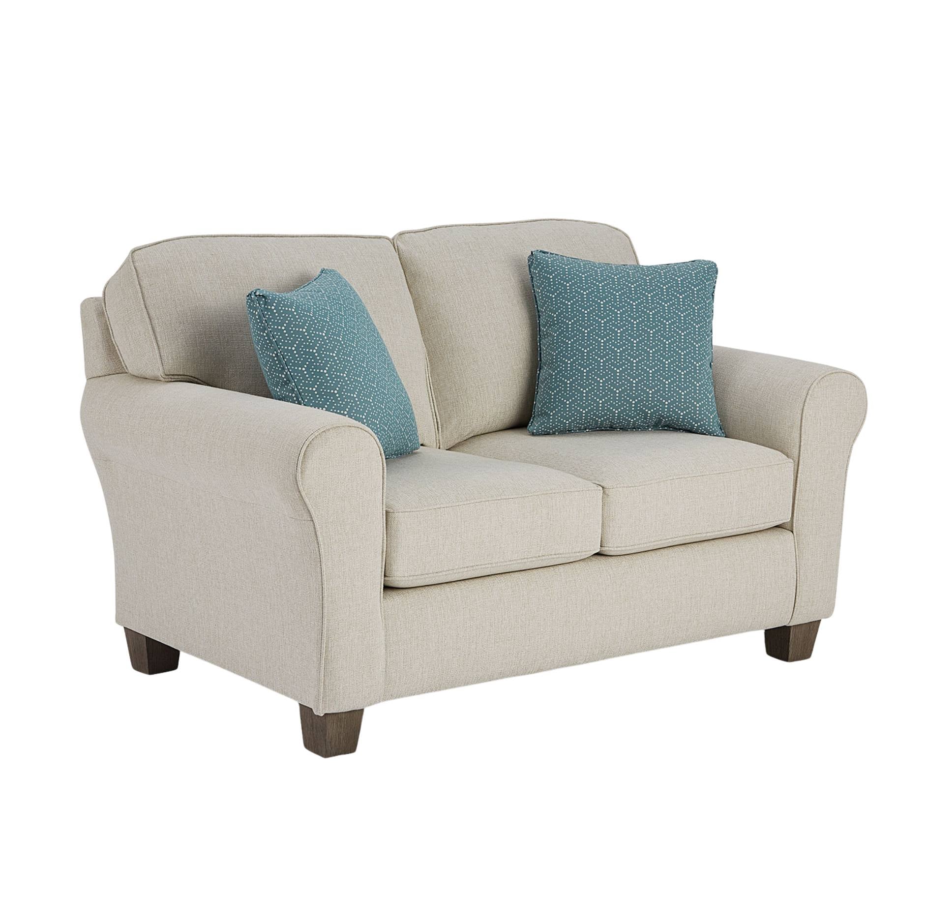 A two-seater loveseat sofa upholstered in light beige fabric, featuring two teal patterned throw pillows and dark brown wooden legs, shown against a plain white background.