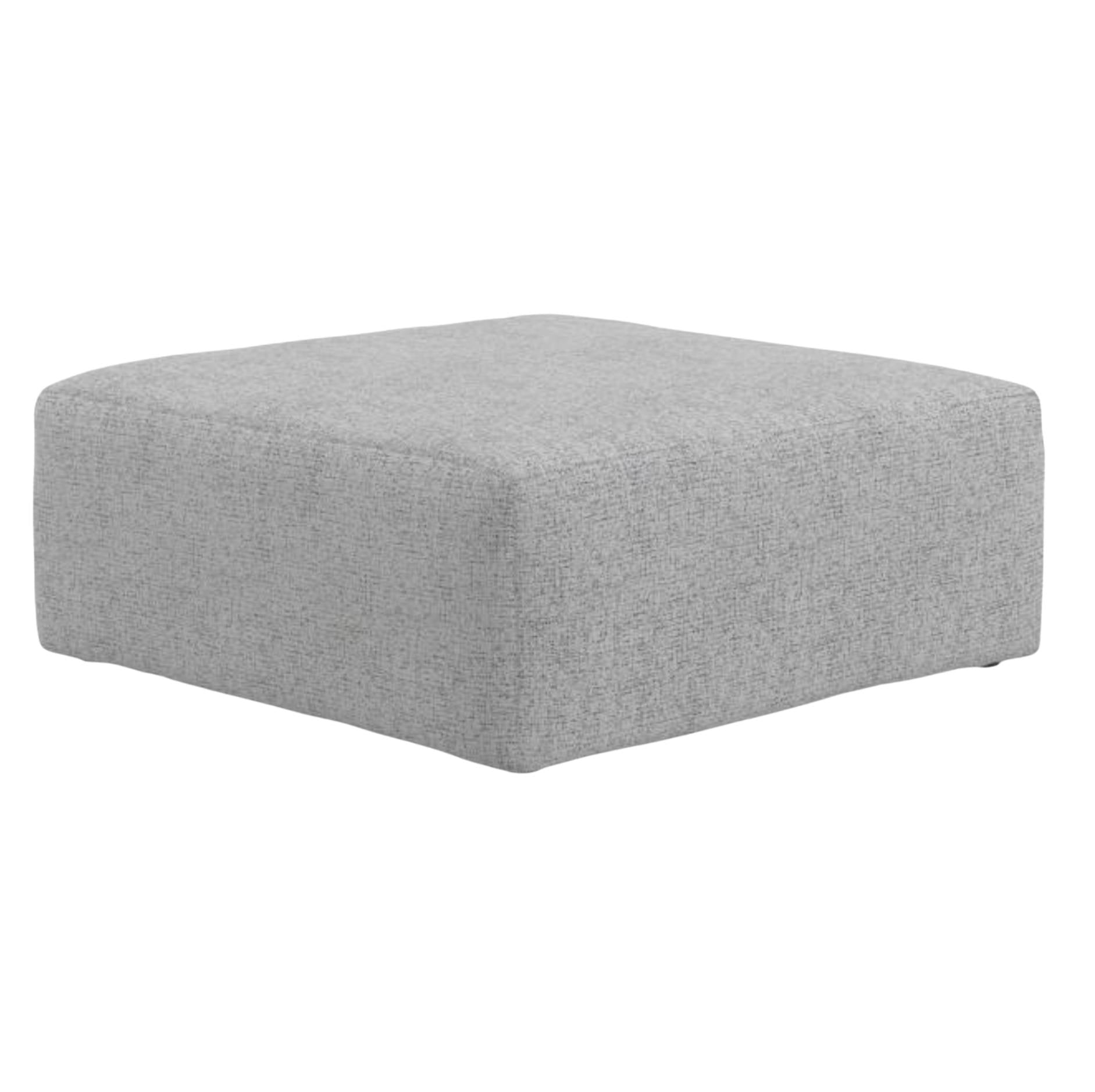 A square, low-profile ottoman upholstered in a light gray textured fabric, shown from a three-quarters perspective against a plain white background.