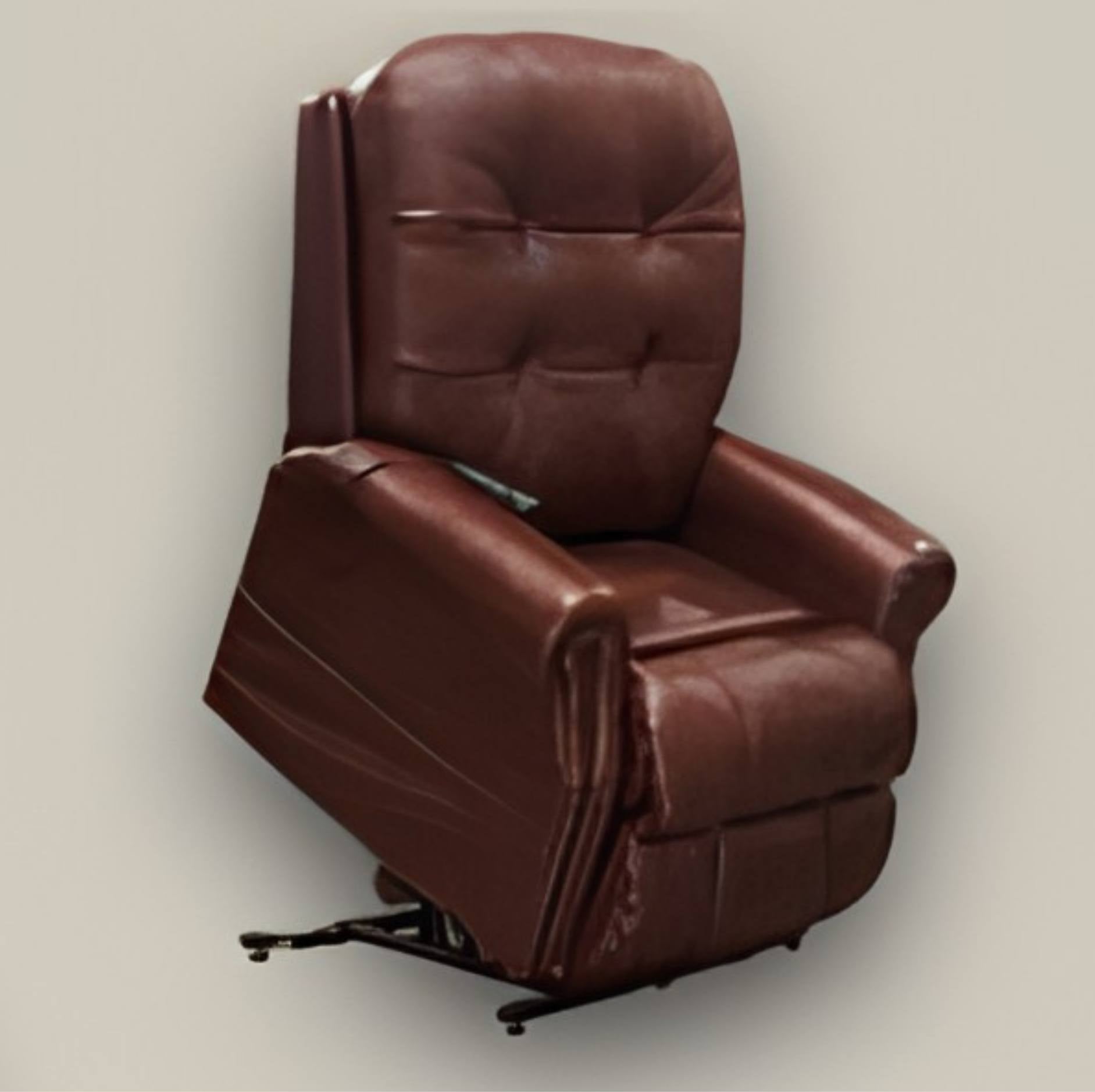 A dark brown leather recliner chair with a high tufted backrest and padded armrests, shown at an angle on a plain light gray background.
