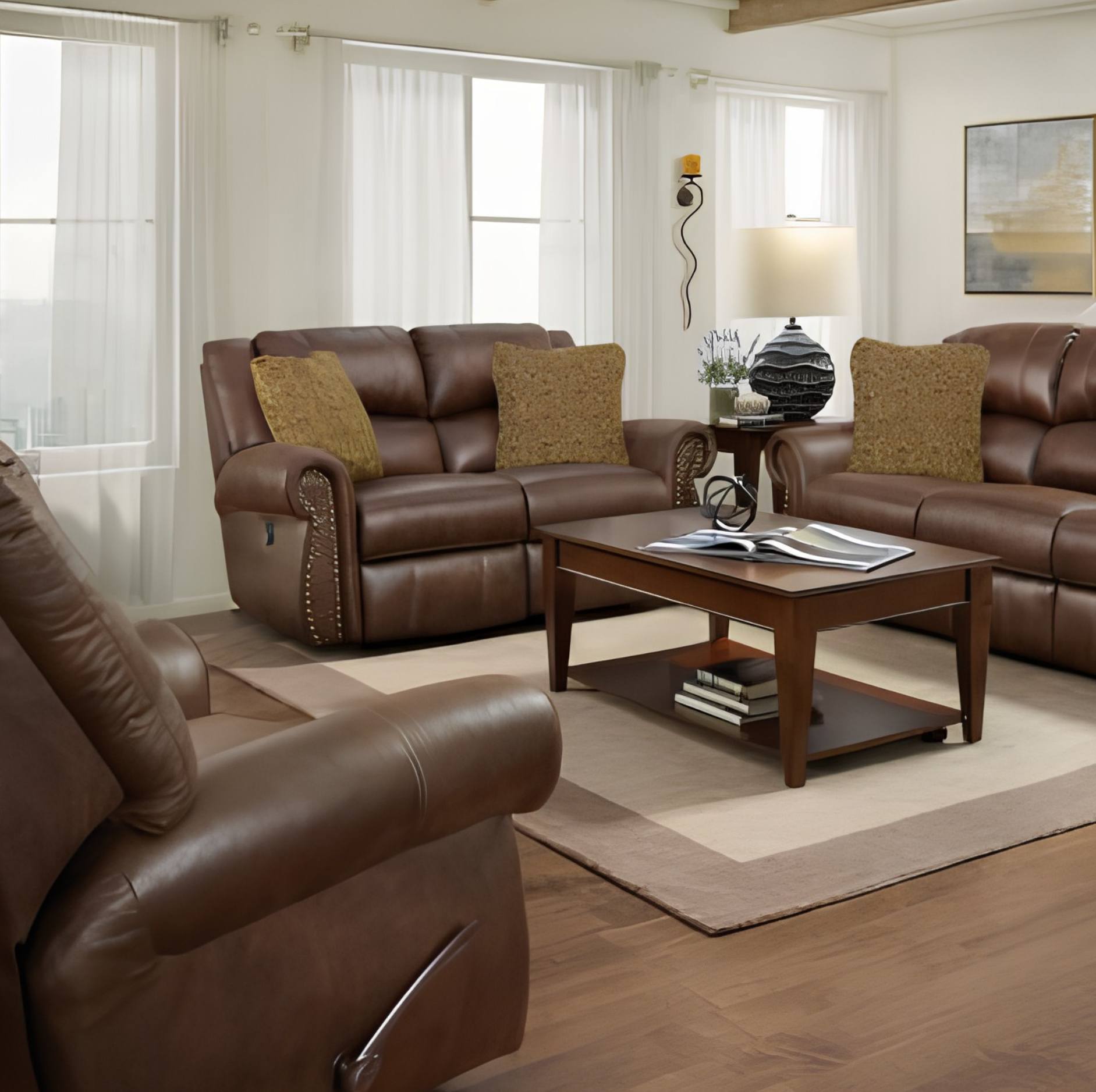 Brown leather reclining sofa set in a bright living room, including a three-seat sofa, matching armchair, and a wooden coffee table on a beige rug.