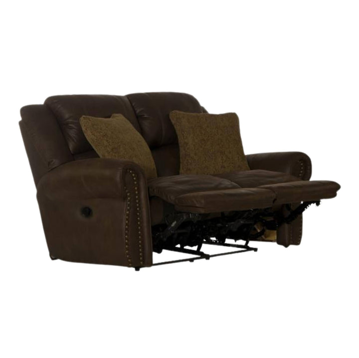 A brown leather reclining loveseat shown with both seat cushions extended and two matching brown throw pillows, isolated on a white background.