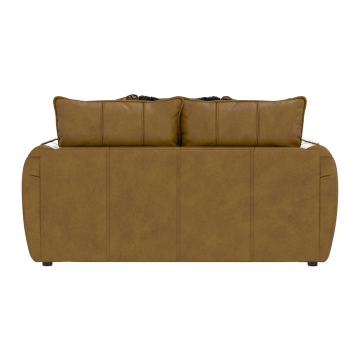 Brown leather sofa with three cushions on a white background