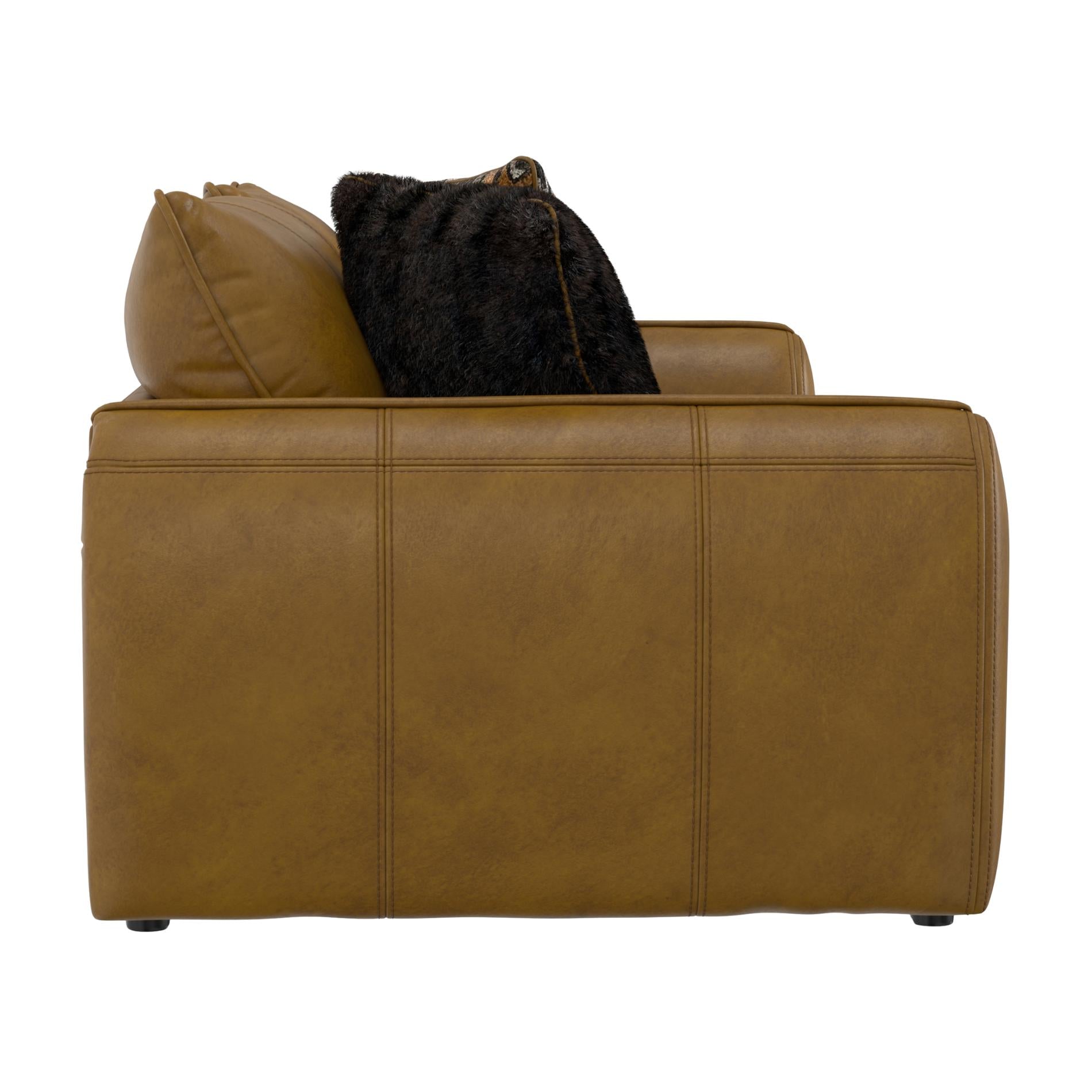 Brown leather sofa with two pillows on a white background
