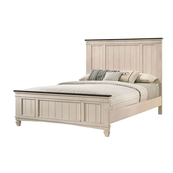 Beige bed with striped bedding on a white background