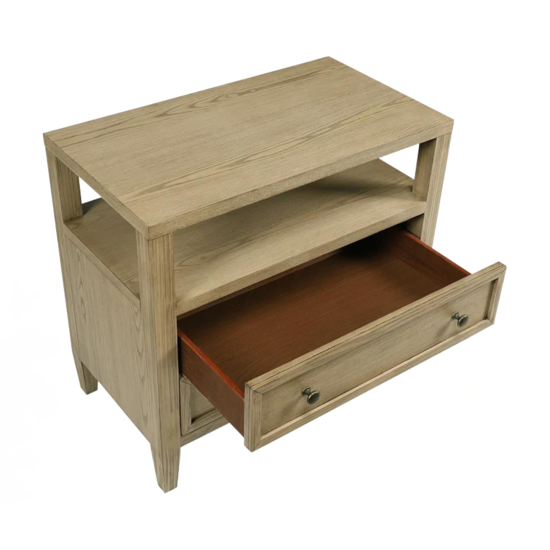 Wooden side table with a drawer open on a white background