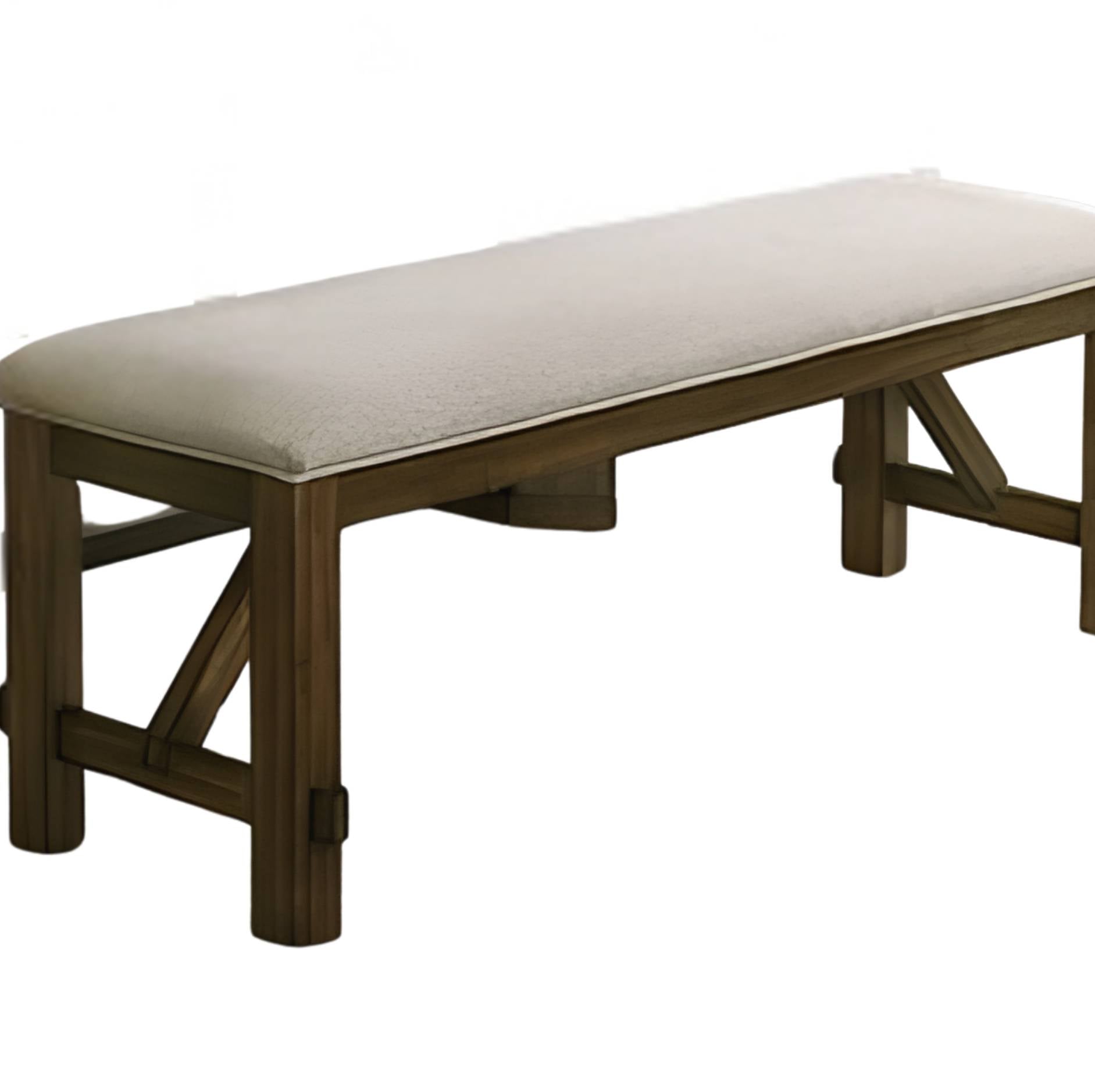 A wooden bench with a long upholstered seat cushion in a light beige fabric, set against a plain white background.