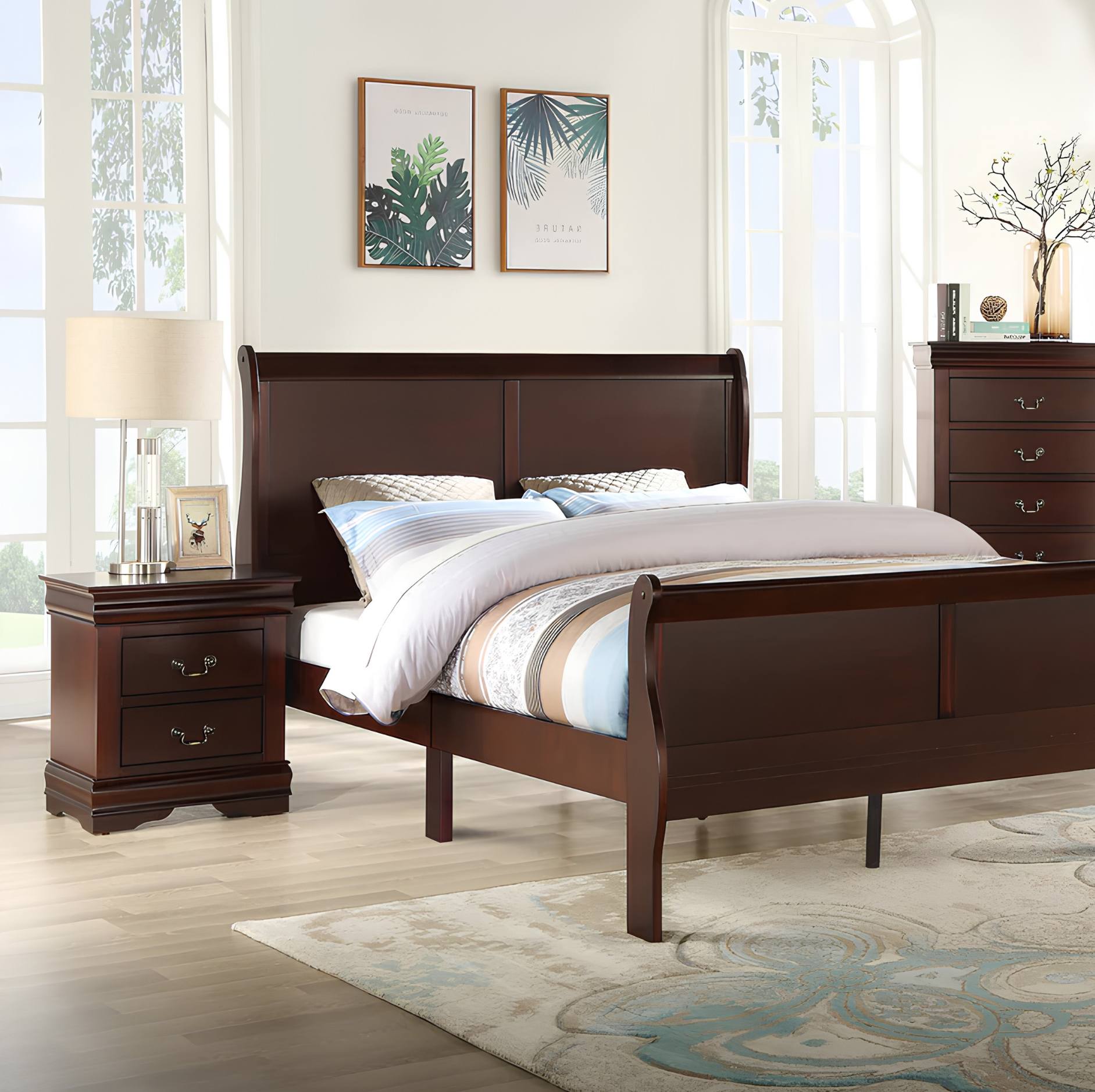 A dark brown wooden sleigh bed frame shown in a bright, modern bedroom setting with a matching nightstand, dresser, and patterned bedding.