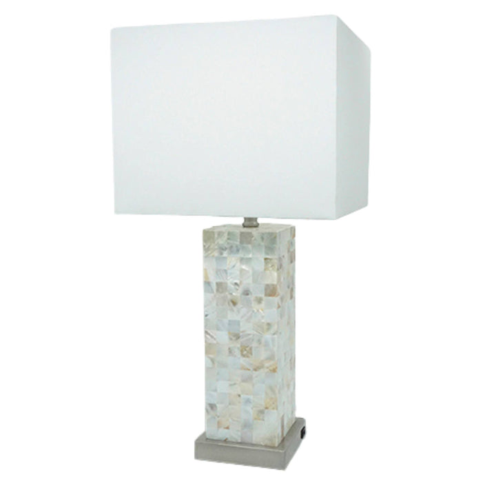 A table lamp with a large white rectangular fabric shade and a mosaic shell-look base on a white background.