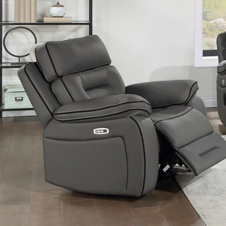 Gray recliner chair in a room with a glass cabinet and rug.
