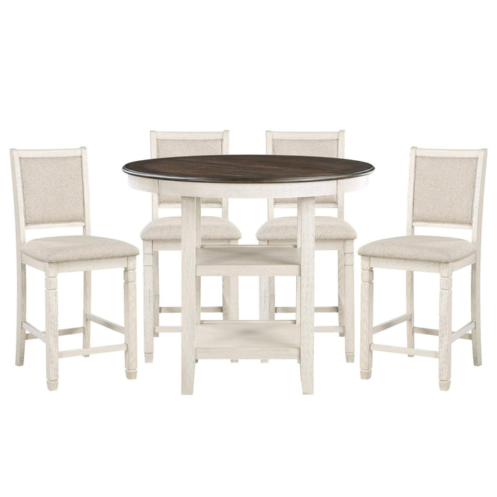 Round dining table with four matching chairs on a white background
