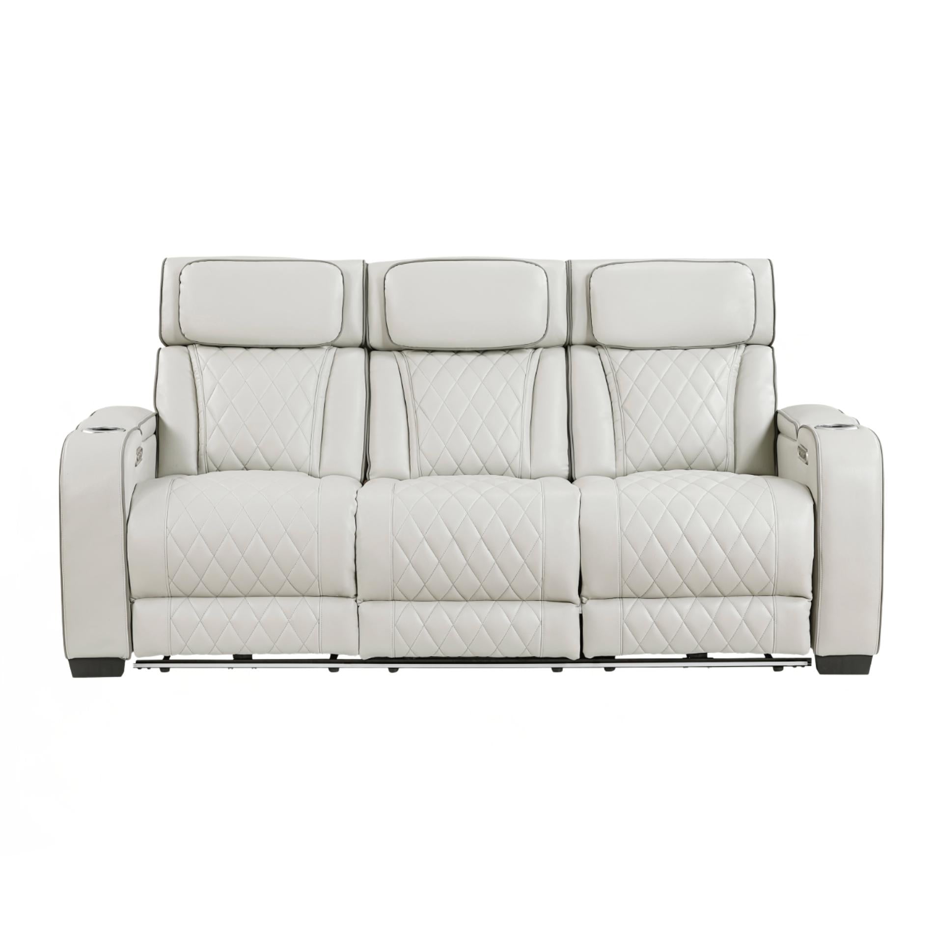 Gray sofa with quilted pattern on a white background