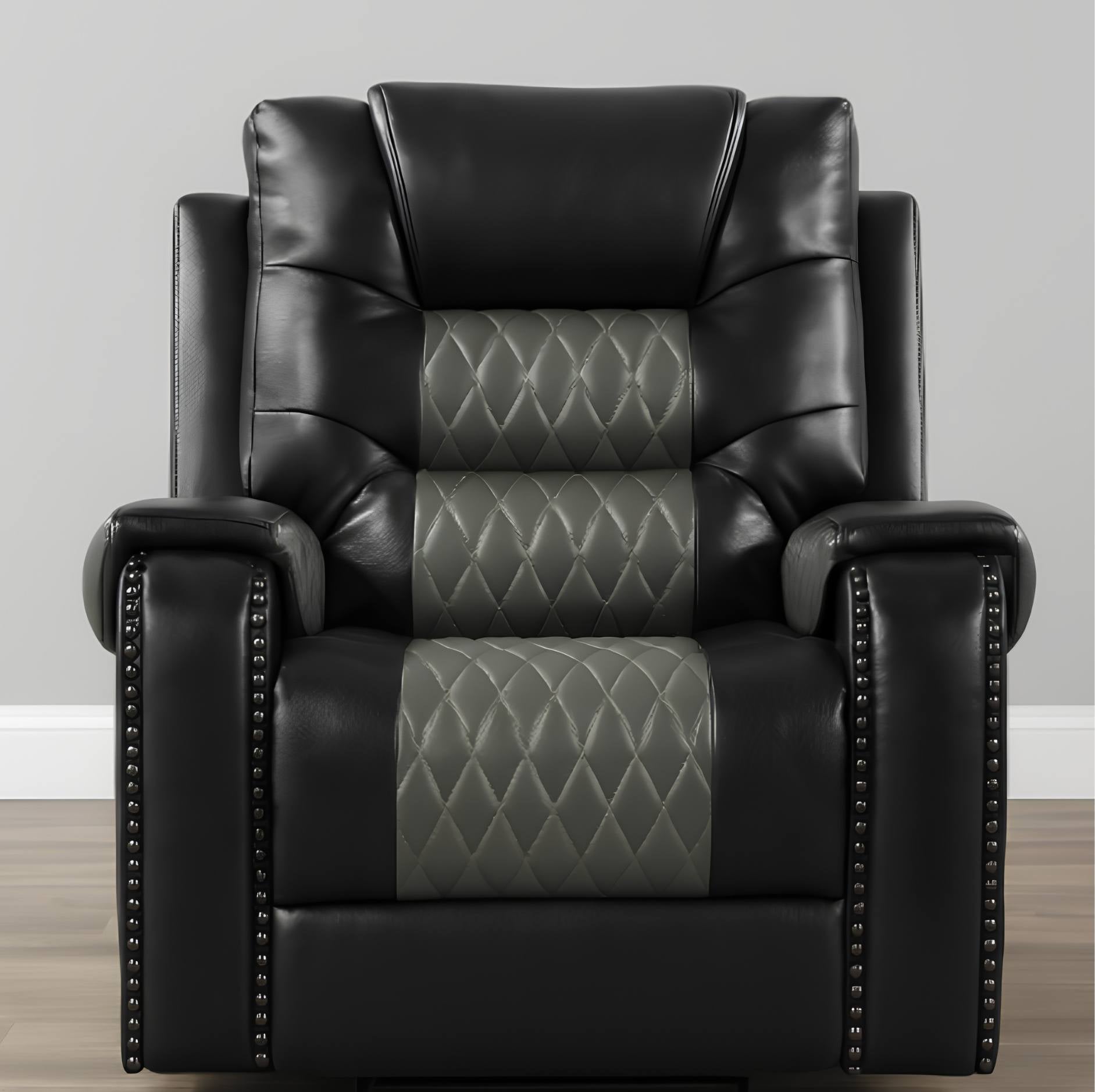 Black faux leather recliner chair with gray quilted diamond-patterned center panels on the backrest, seat, and armrests, plus silver nailhead trim on the outer arms, shown against a plain gray wall and light wood floor.