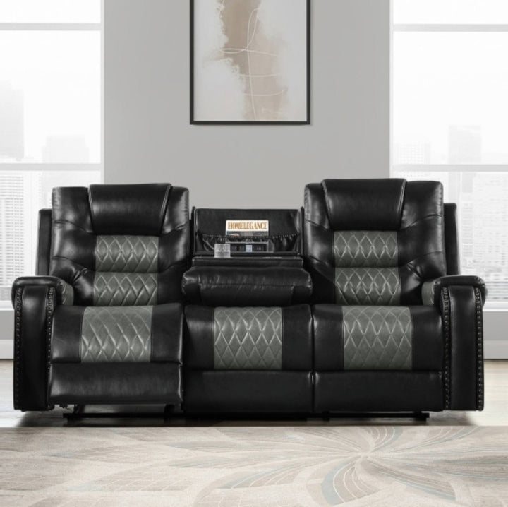 A three-seat black leather reclining sofa with gray diamond-quilted center panels on the backrests and seat cushions, shown in a modern living room setting.