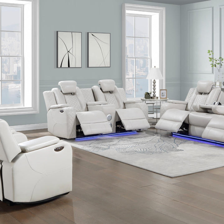 Modern living room with white recliner chairs and light blue walls.