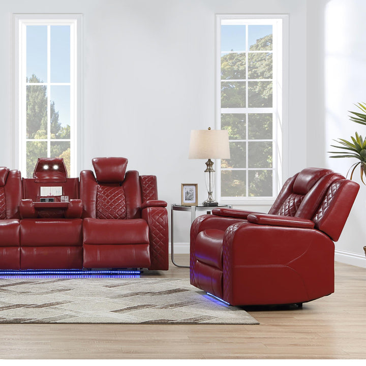 Red leather recliner sofa set in a living room with large windows.