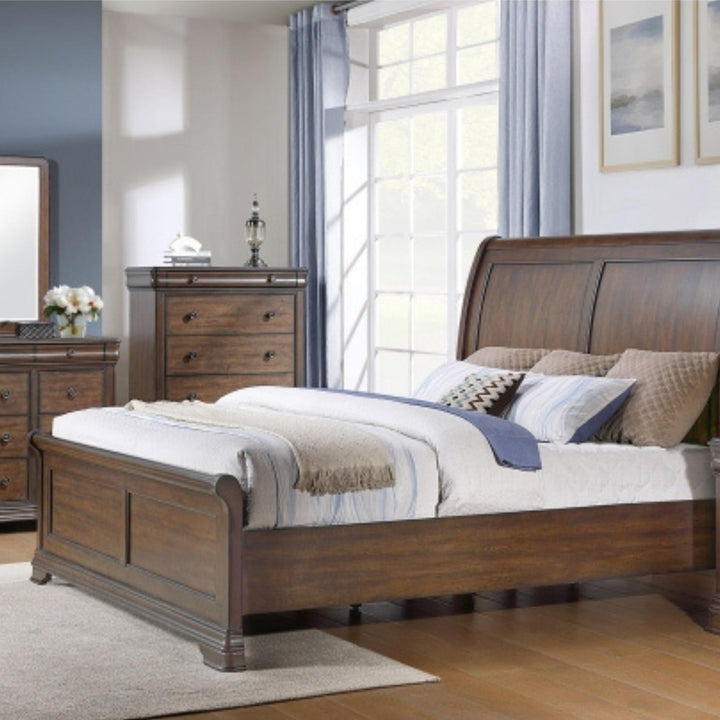 Wooden bed in a bedroom with furniture and decor