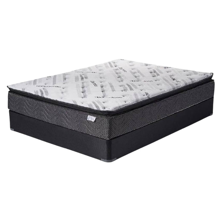 A mattress with a patterned white and gray quilted top and a dark charcoal textured side panel, shown on a plain white background.
