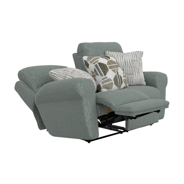 Gray recliner sofa with three pillows on a white background