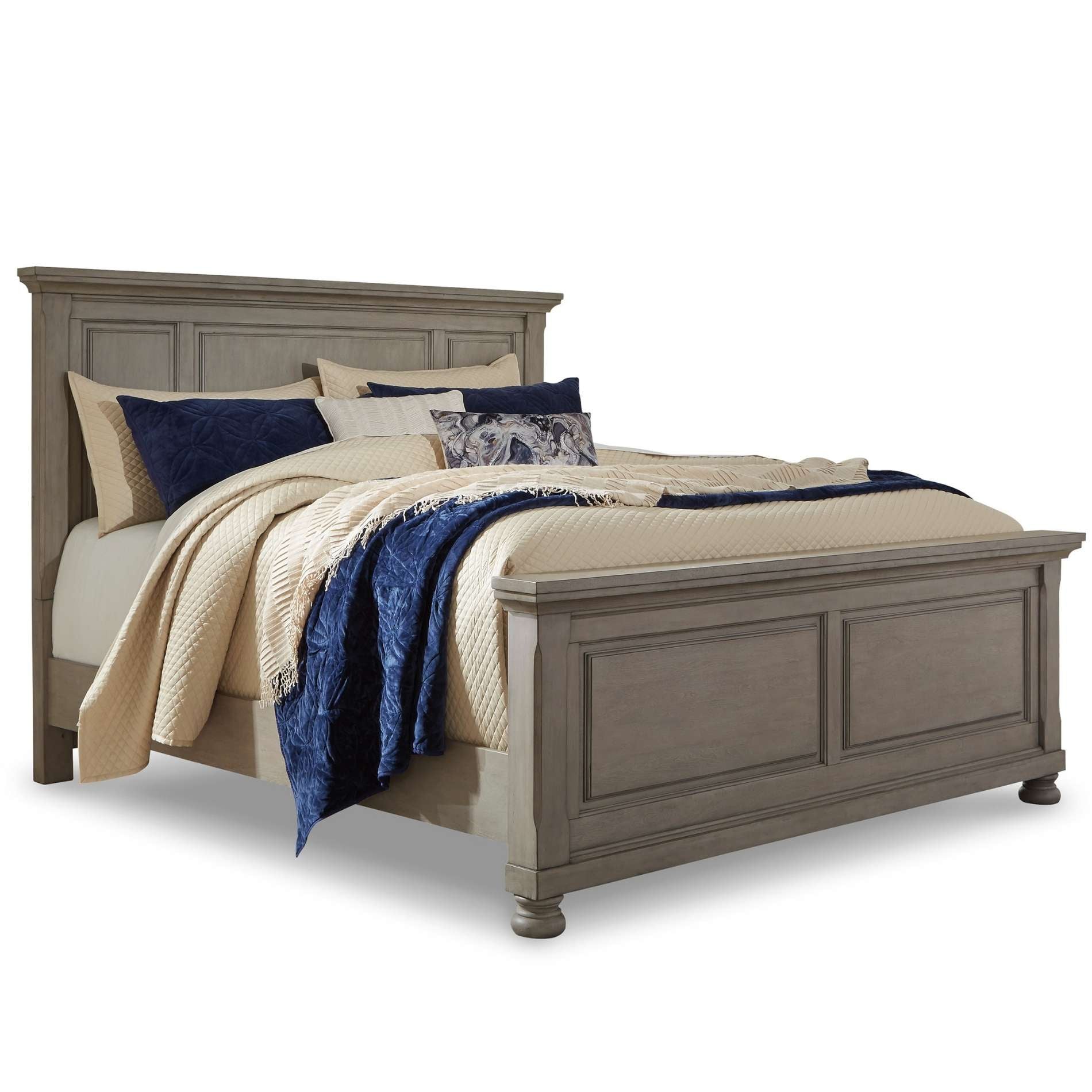 Wooden bed with beige bedding and blue throw blanket on a white background