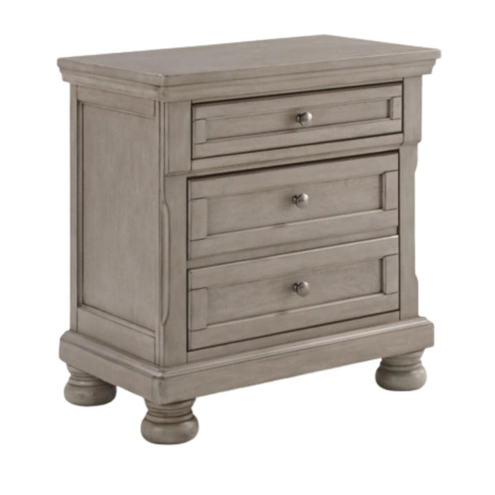 Wooden dresser with three drawers on a white background