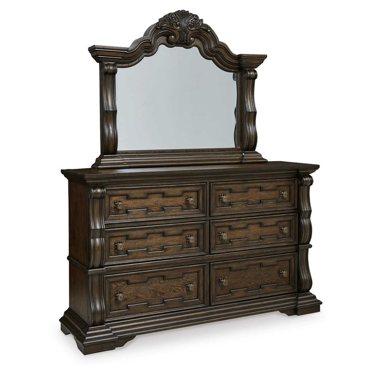 Dark wood dresser with mirror on a white background