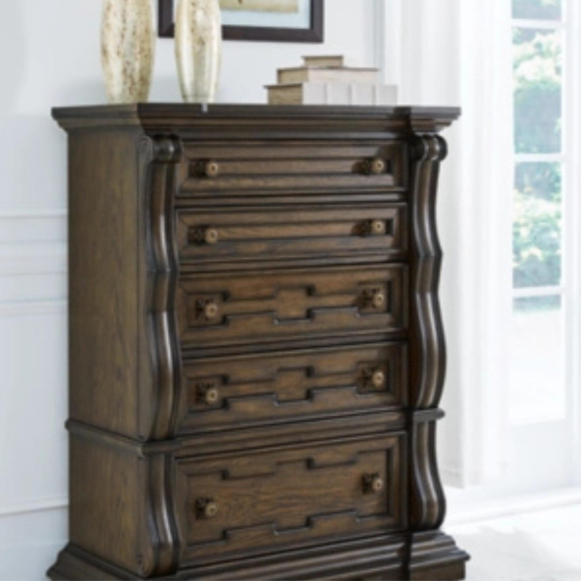 Wooden dresser with decorative elements in a room setting