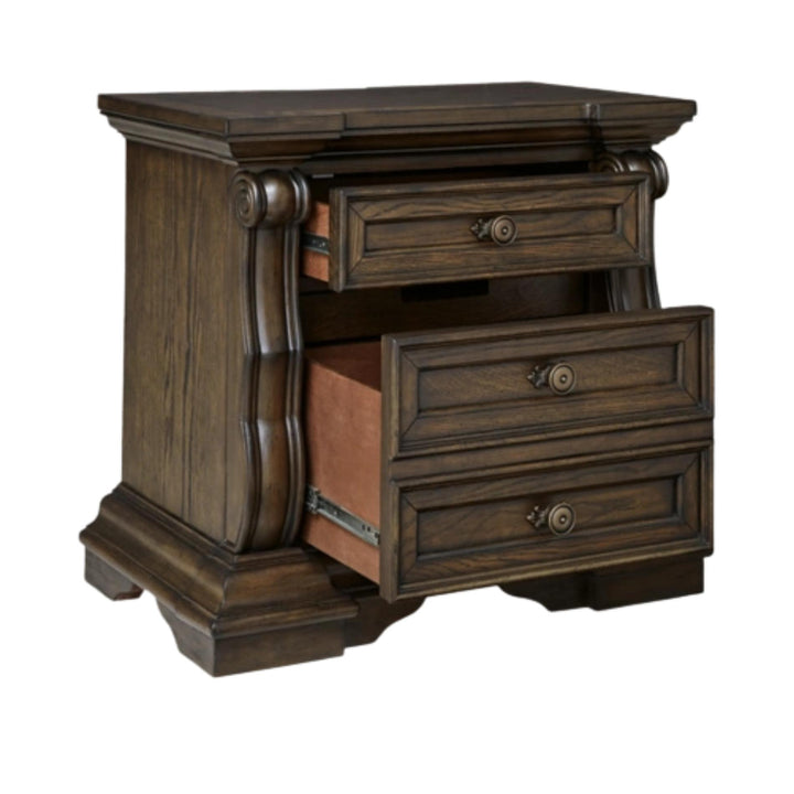 Wooden nightstand with three drawers on a white background