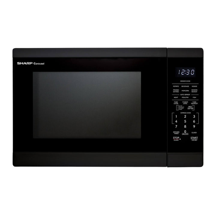 A black Sharp Corcel microwave oven with a digital control panel on the right side, shown against a plain white background.